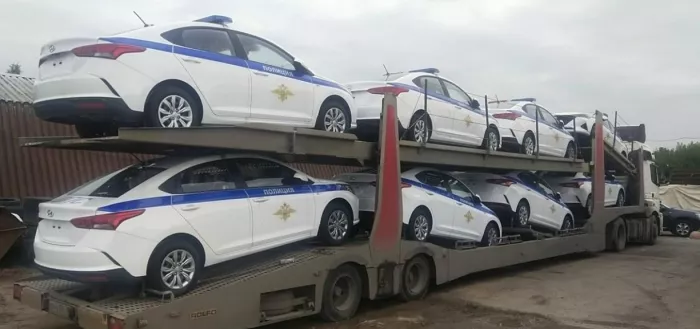 Компания по перевозке автомобилей автовозами "Тандем трэк".